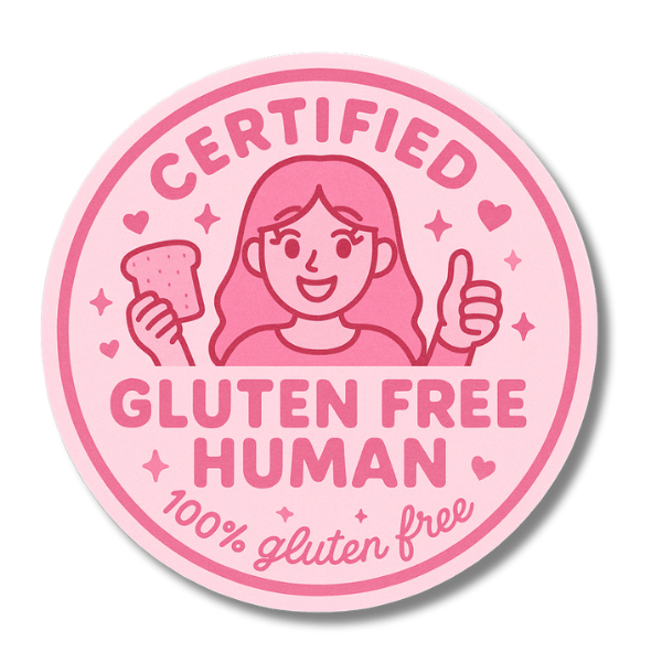 Pink "Certified Gluten Free Human" vinyl sticker featuring a cartoon girl holding gluten free toast and giving a thumbs up