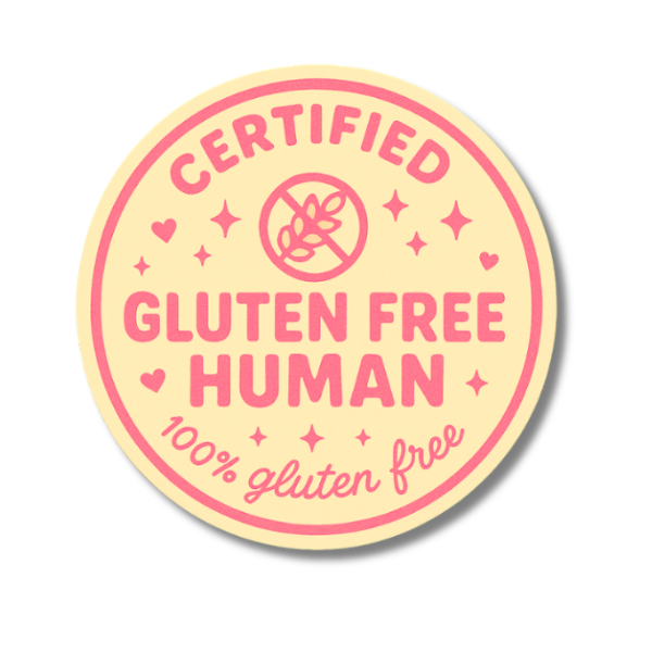 Certified Gluten Free Human sticker with pink text on a yellow background