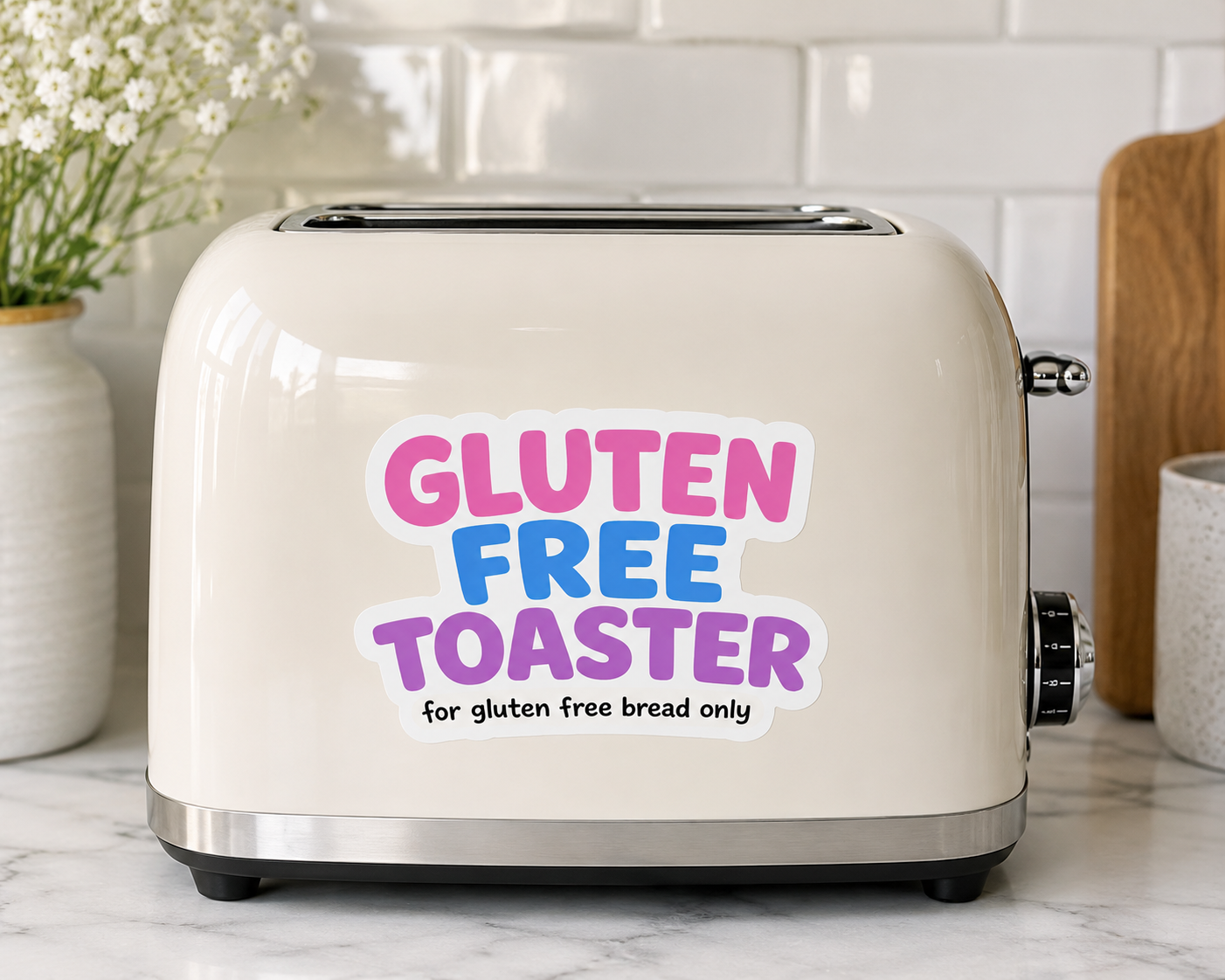 White toaster with a Gluten Free Toaster sticker on the front for gluten free bread only.