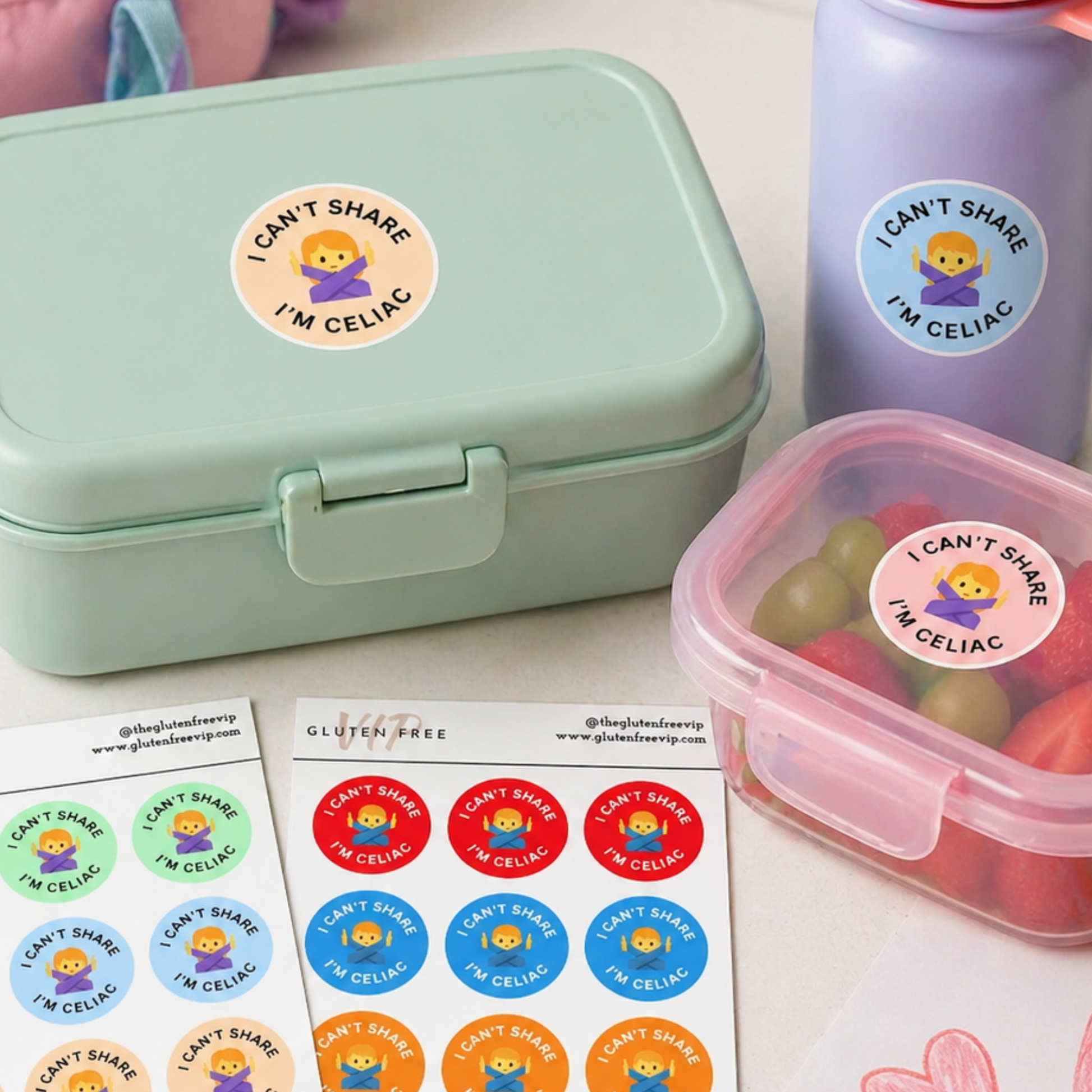 Kids “I Can’t Share, I’m Celiac” labels on a lunchbox, water bottle, snack container, and label sheets.