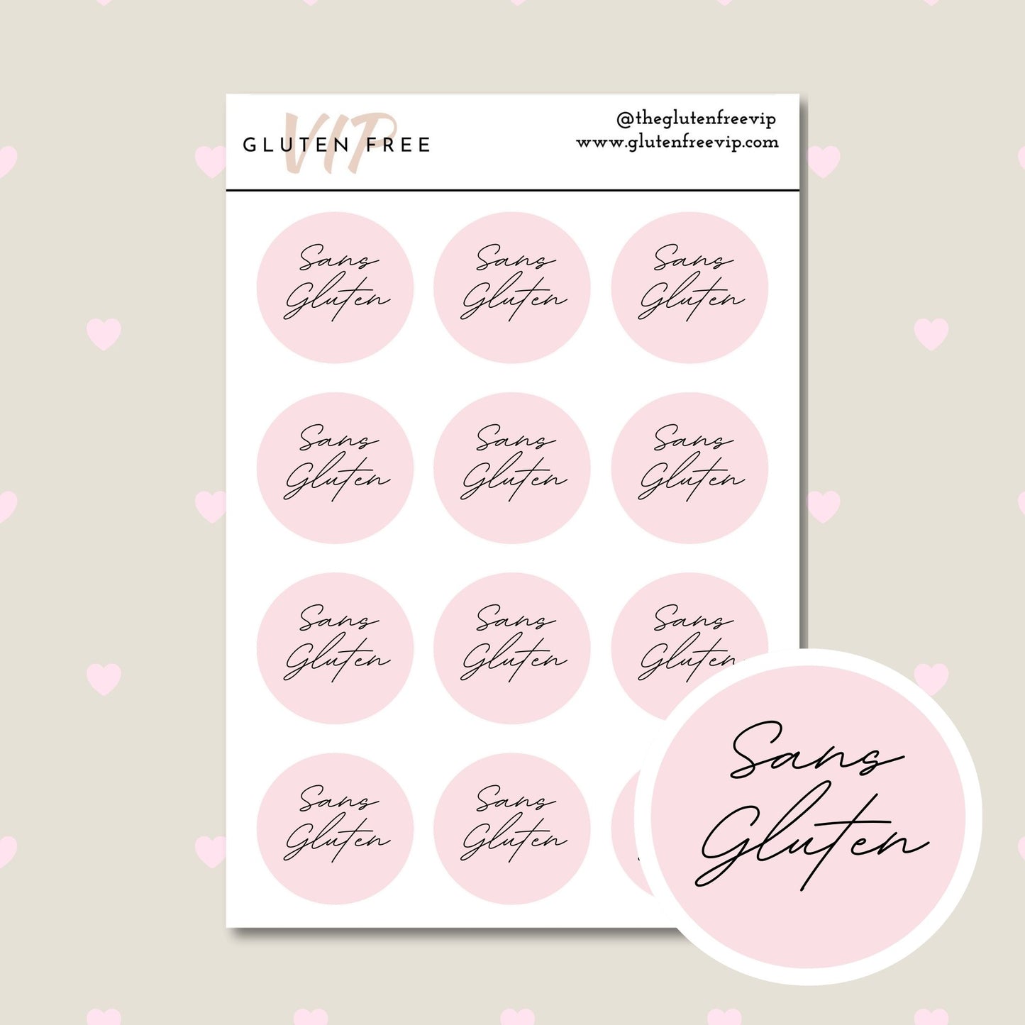 Sheet of pink round “Sans Gluten” labels with script lettering.