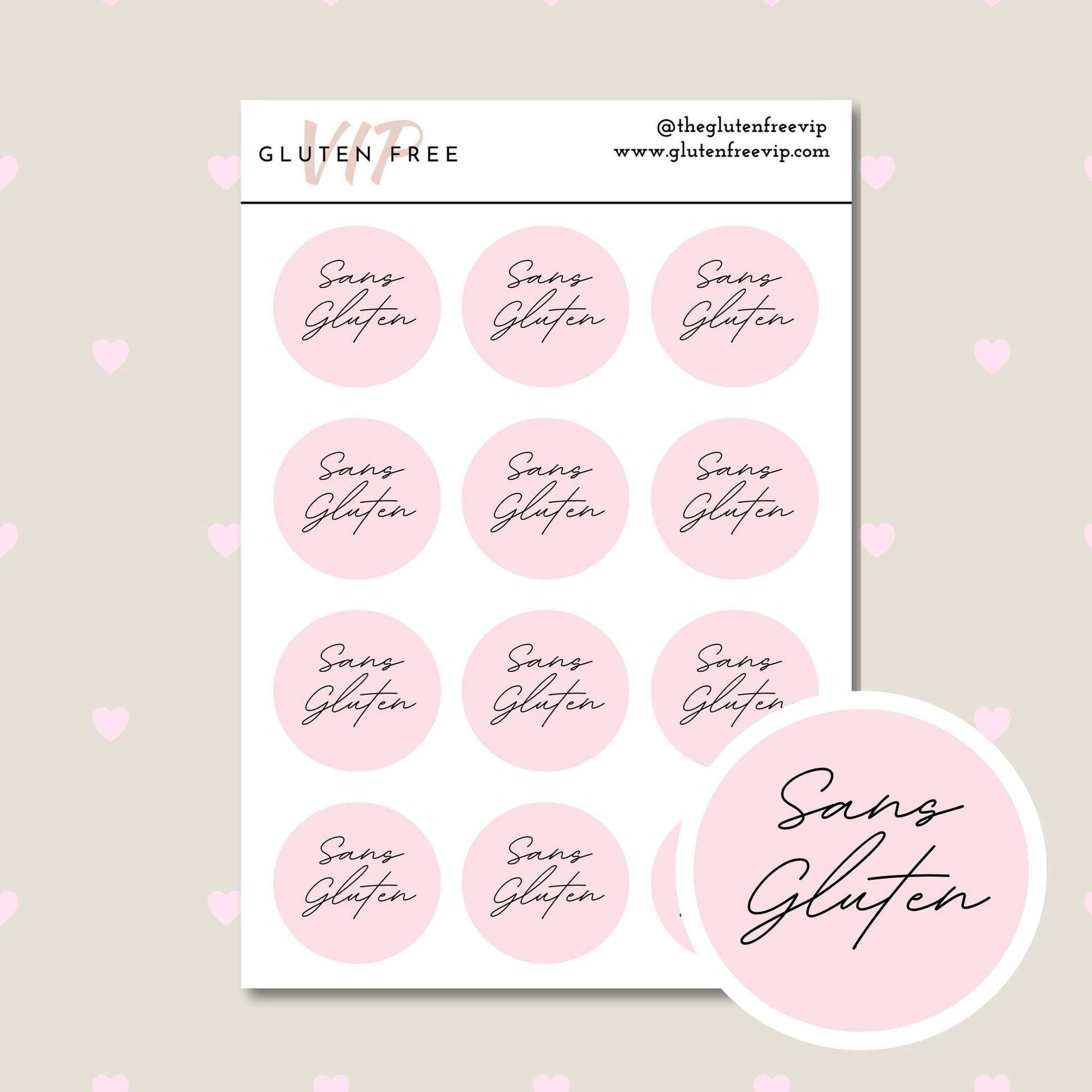 Sheet of pink round “Sans Gluten” labels with script lettering.