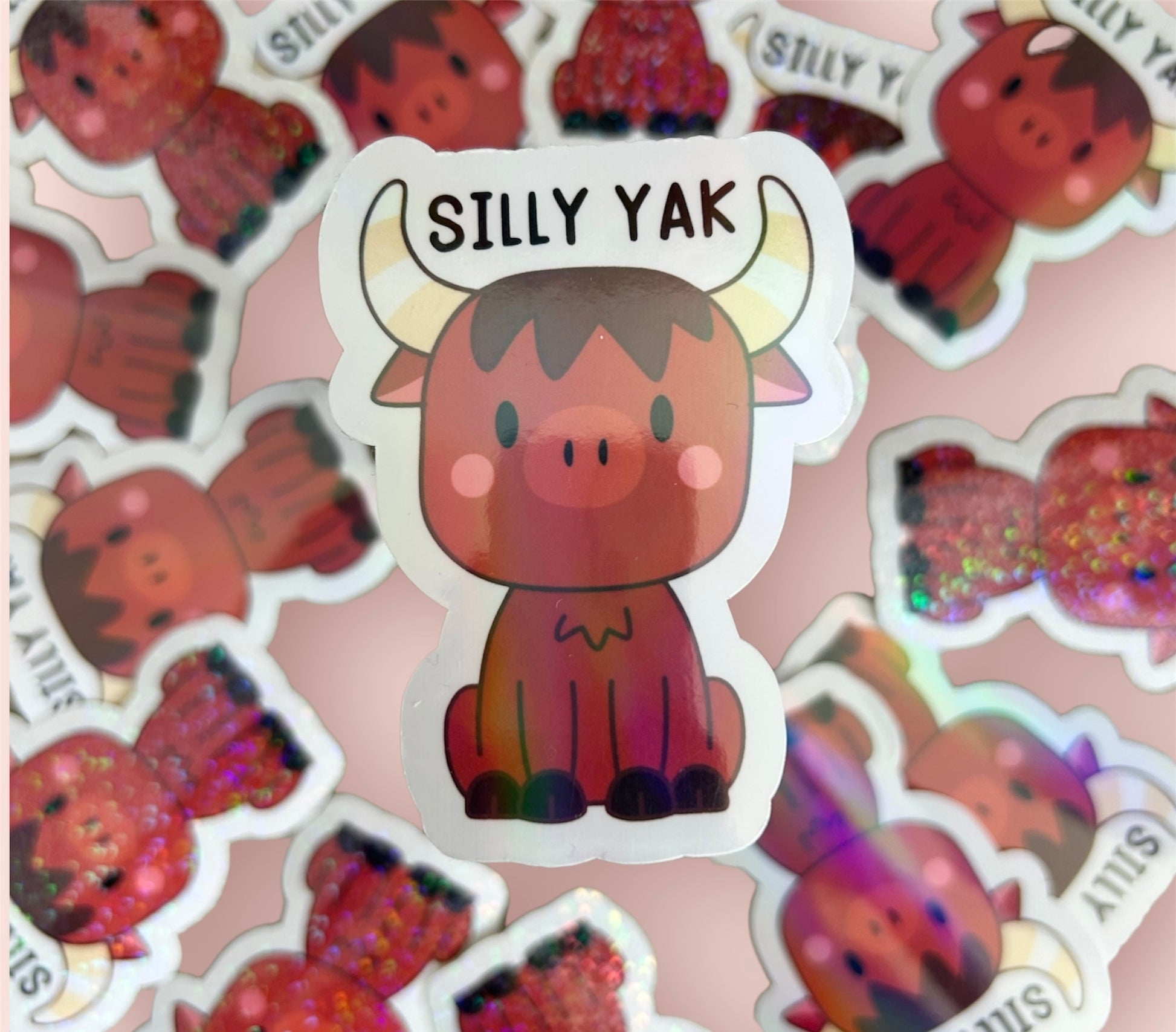 “Silly Yak” sticker displayed on top of a pile of colourful gluten free stickers.